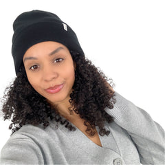 Model wearing osocurly satin lined beanie